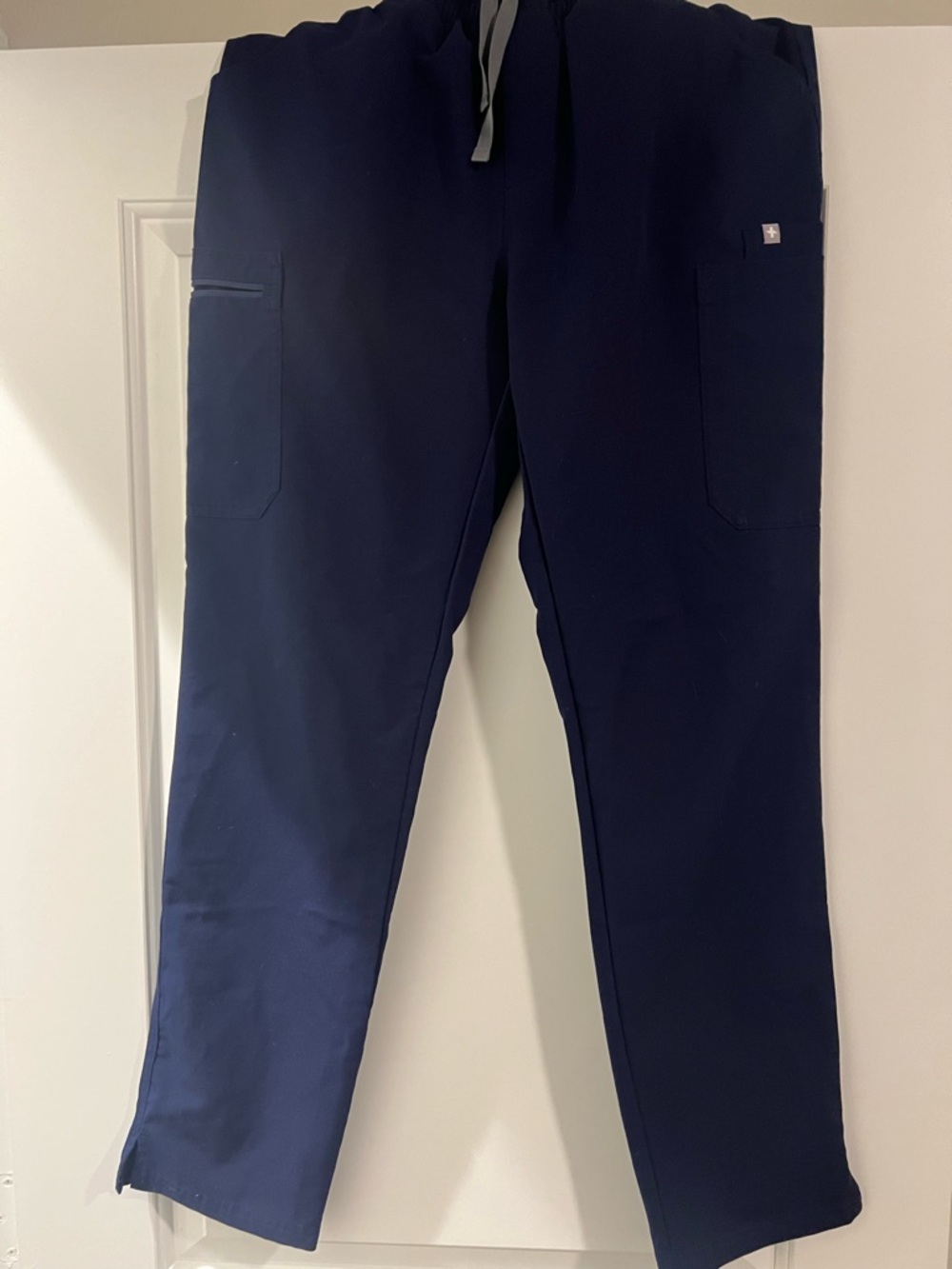 Navy women’s figs scrub pant.